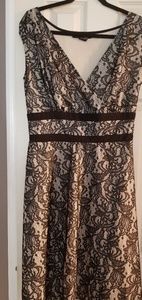 Woman black lace evening dress.